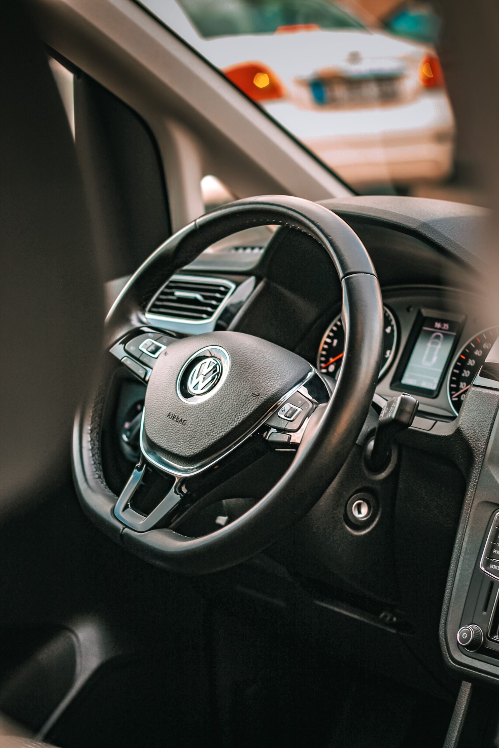 Detailed view of a Volkswagen steering wheel and dashboard in Istanbul, Turkey.